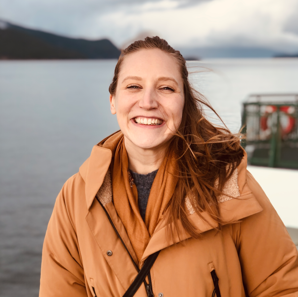 Headshot of Anna Pedersen standing on a boat